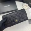 Chanel wallet in black caviar leather with gold hardware