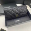 Chanel wallet in black caviar leather with gold hardware