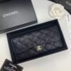 Chanel wallet in black caviar leather with gold hardware