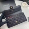 Chanel wallet in black caviar leather with gold hardware